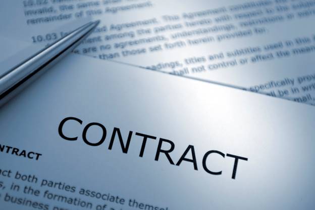 Close-up of a contract with a pen

AI-generated content may be incorrect.